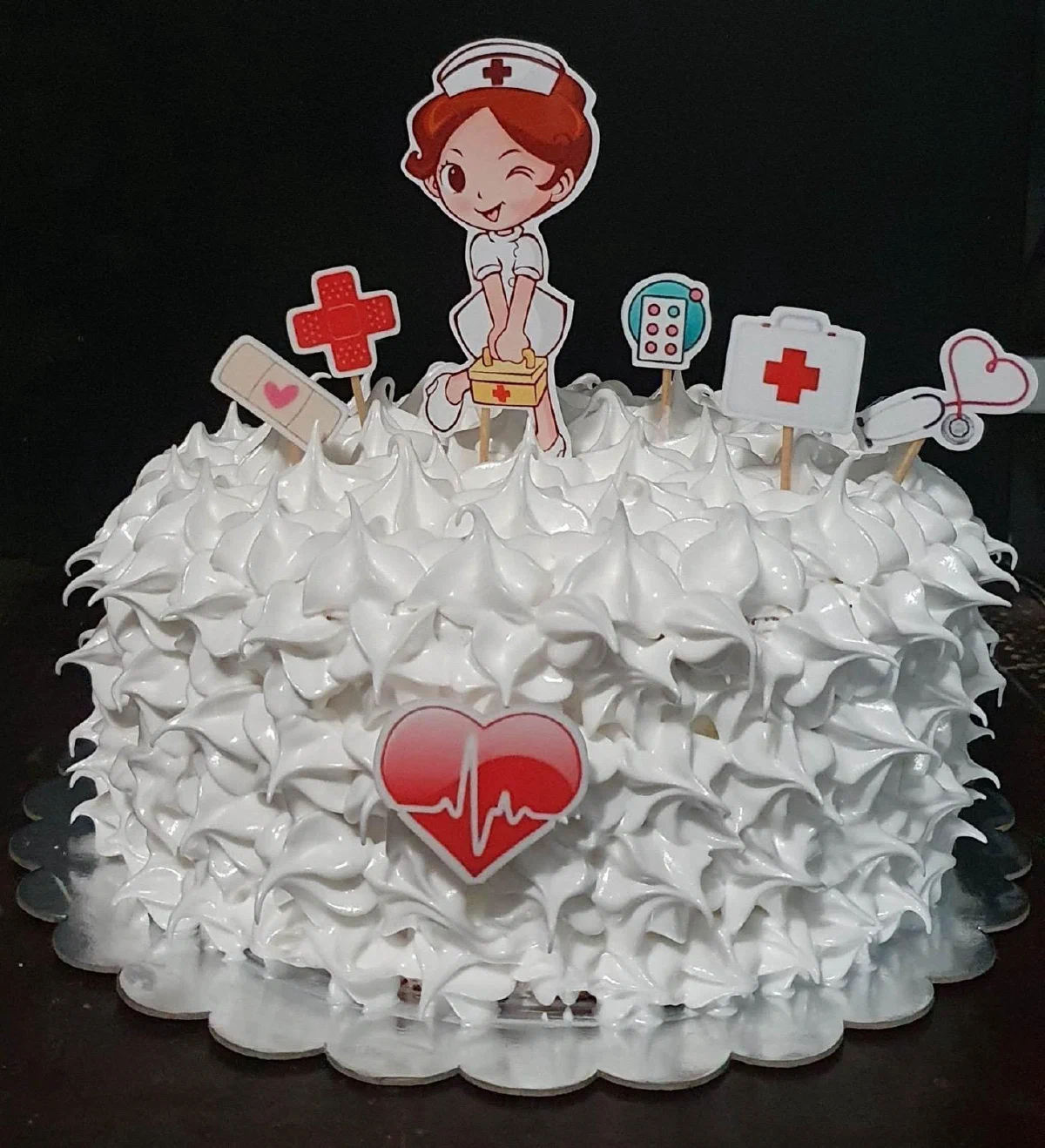 Torta personalizada con decoración alusiva a una profesión